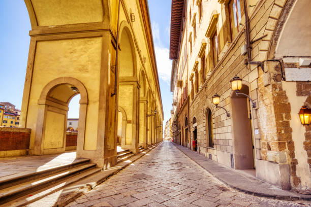 istock Ponte Vecchio Bridge during Beautiful Sunny Day with Reflection in Arno River, Florence 1421375885