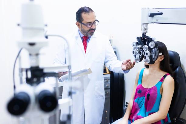 istock Doctor using the foroptor in consultation 1421376860