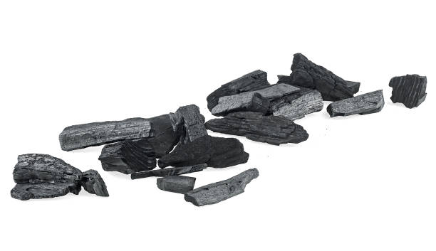 istock Charcoal particles isolated on a white background. Hardwood charcoal. 1421377995