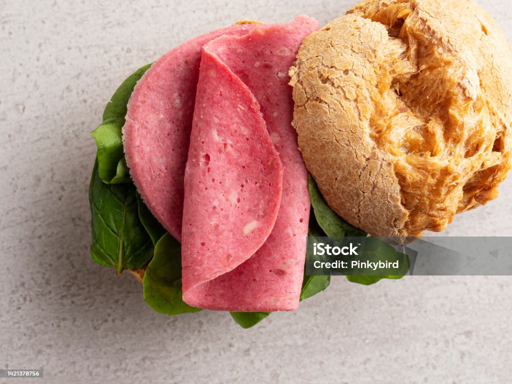 Salami sandwich, Gougeres, Choux sandwich with salami, Artisan Salami Sandwich, Sandwich Round Loaf, Bread, Choux pastry, salty, Food and drink, Appetizer, Savory Food, Salted, Breakfast, Bacon Appetizer Stock Photo