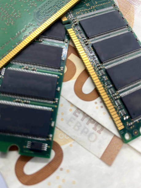 istock Closeup of RAM memory on euro banknotes with selective focus on foreground 1421385733