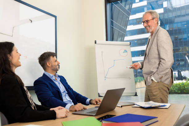 istock Businesspeople having a briefing 1421387196