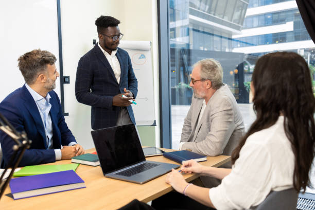 istock Office colleagues having casual discussion 1421387242
