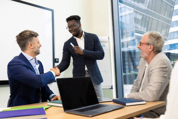 istock Office colleagues having casual discussion 1421387261
