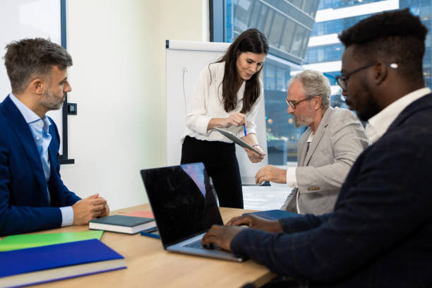 istock Office colleagues having casual discussion 1421387335