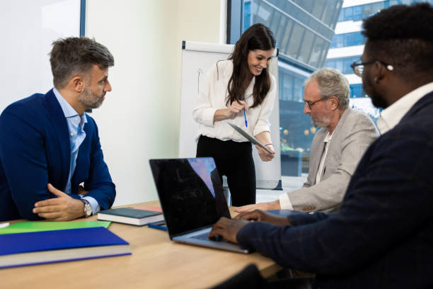 istock Businesspeople having a briefing 1421387341