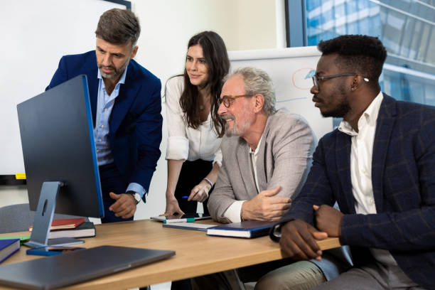 istock Office colleagues having casual discussion 1421387379