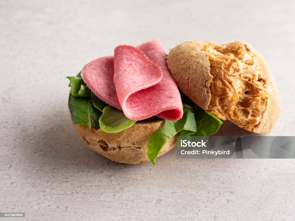 Sandwich, Gougeres, Choux sandwich with salami, Artisan Salami Sandwich, Salami sandwich Round Loaf, Bread, Choux pastry, salty, Food and drink, Appetizer, Savory Food, Salted, Breakfast, Bacon Appetizer Stock Photo