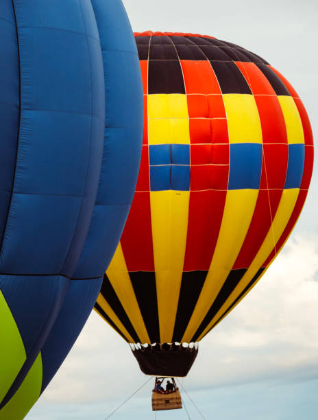 istock Multiple hot air balloons in the sky. 1421389386