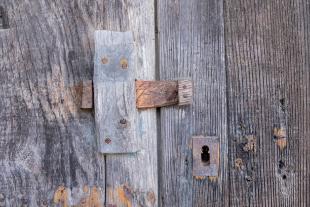 istock old and weathered door with traditional locking system 1421389795