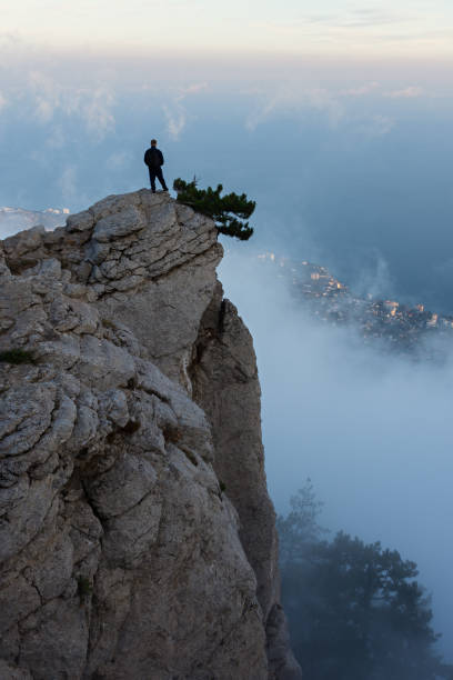 istock Traveler. A man in the mountains. 1421394805