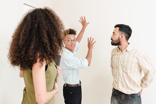 Real estate agent serving same-sex couple.