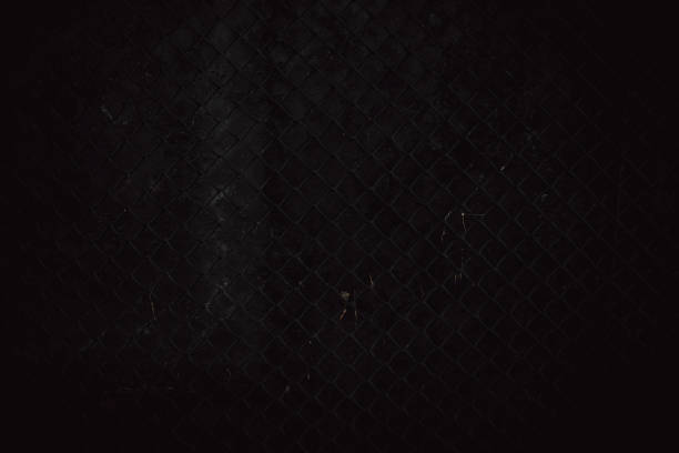 istock Metal grid. Dark Backgrounds. Rock surface with cracks. Abstract texture. Rock texture. Wall Copper texture. Structure Rock pile. Stone background. Rock background. 1421410630