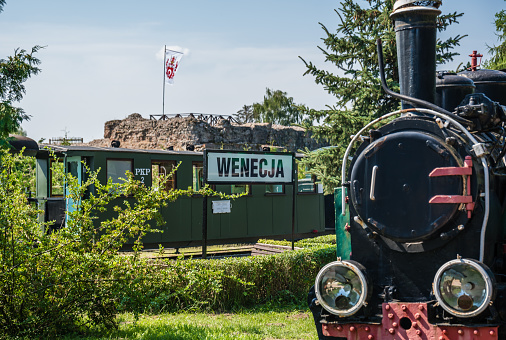 Wenecja, Poland - August 2020 : Old locomotive in narrow gauge train museum