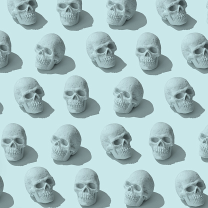 Skull monochrom pattern background. Halloween minimal concept.