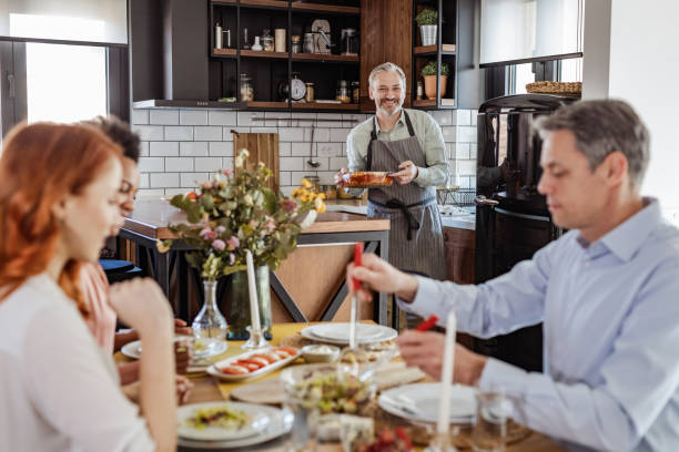 istock Friends having weekend lunch together 1421413391