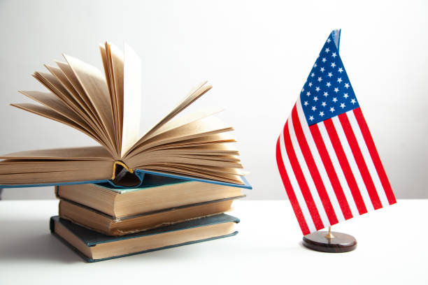 istock Stack of books with  American flag 1421413754