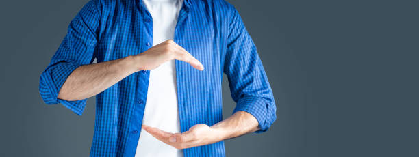 istock Businessman  showing his empty hand 1421413782