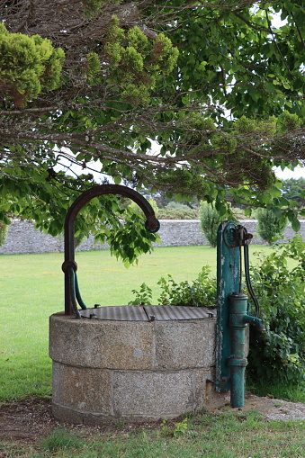 A well in a garden in Brittany