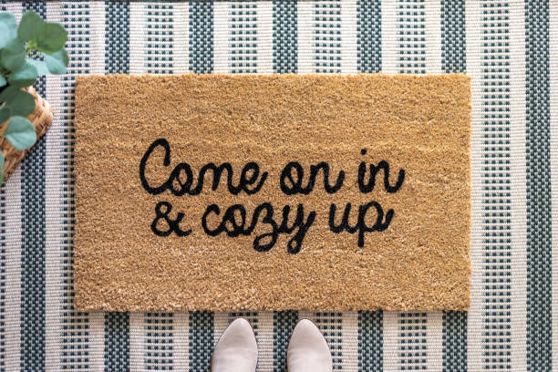 Stylish welcome mat with boots