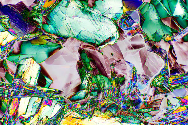Abstract micrograph of amino acid crystals, methionine, photographed with a microscope at 40X, with polarization and manipulated color.