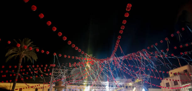 istock Live music performance decorated with paper lanterns and streamers 1421418950