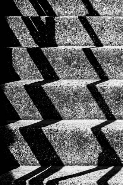 istock Shadows on a set of stone steps 1421428674