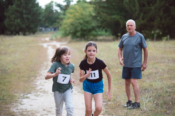 istock Children running race 1421430336