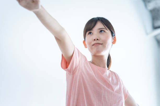 istock Japanese woman training at home 1421433096
