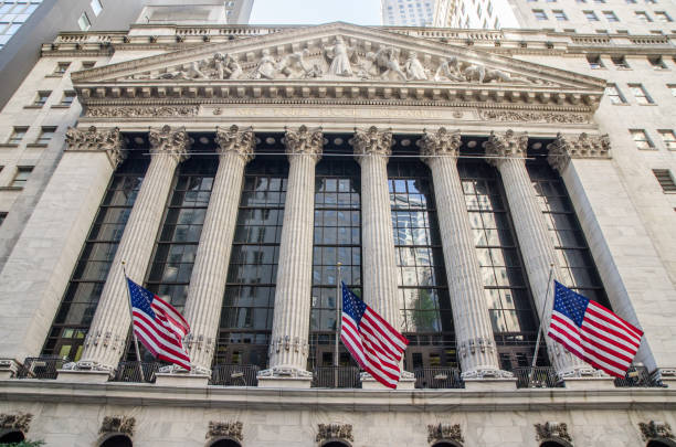 New York City, USA - February 14, 2009: The main facade of the famous New York Stock Exchange Building exterior, the largest stock exchange in the world. This historic landmark, located at 11 Wall Street, has been in continuous operation since it was built in 1903.
