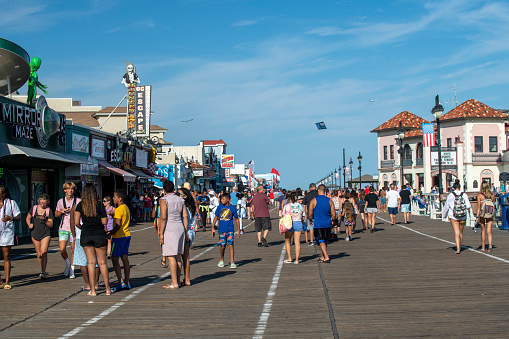 Ocean City, USA - September 3, 2022. People walking on boardwalk, Ocean City, New Jersey, USA