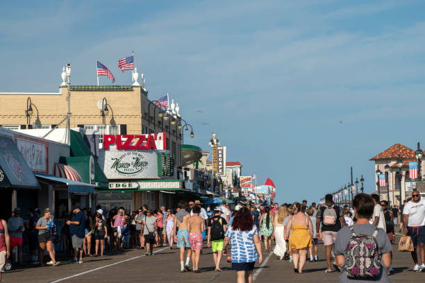 Ocean City, USA - September 3, 2022. People walking on boardwalk, Ocean City, New Jersey, USA