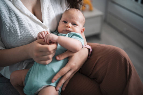 istock Taking care of baby son. 1421439244