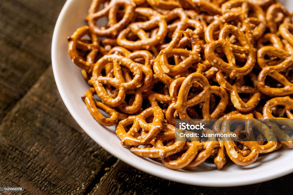 Crunchy snack pretzels from above Bowl of  Crunchy snack pretzels from above Bowl Stock Photo