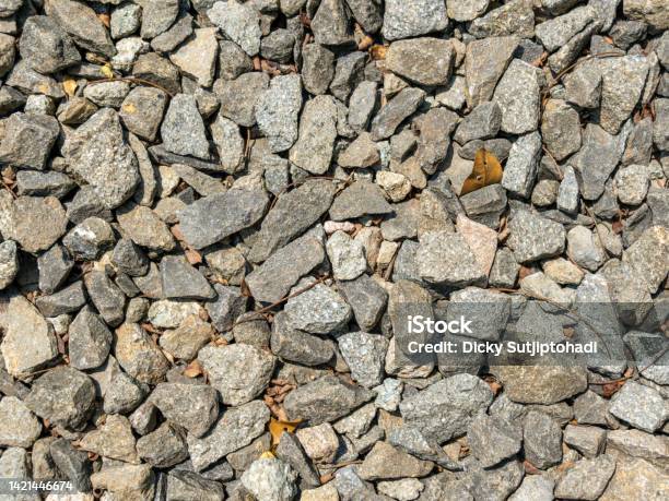 An Overlay Of Grey Pebbles Texture Stock Photo - Download Image Now - Abstract, Beach, Built Structure