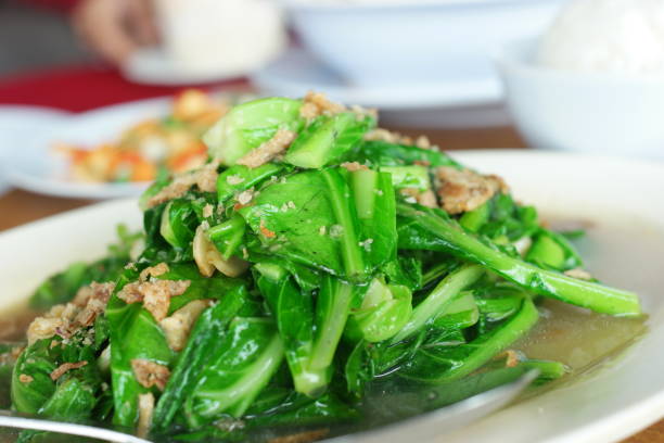 Fresh green stir fried pak choi stock photo