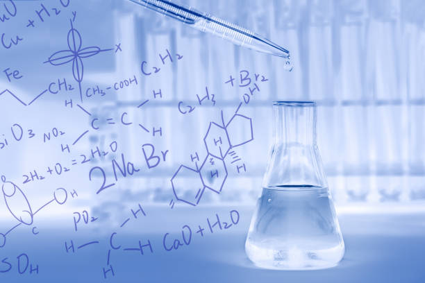 science and laboratory background of lab flask with dropper drop some blue liquid with blurred background of test tubes in laboratory overlay with chemical molecular