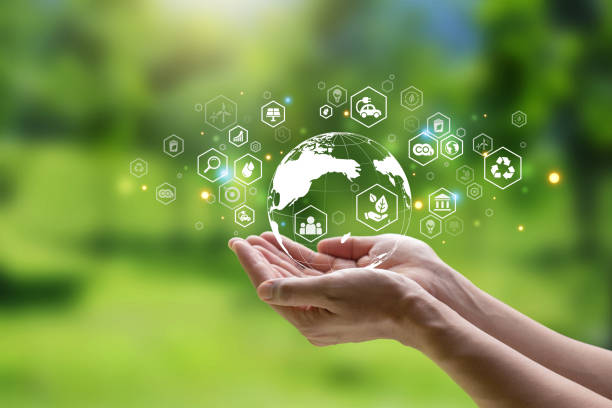 Hand of human holding earth with ESG icon. stock photo