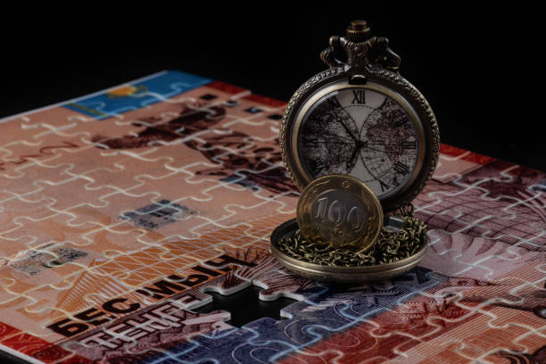 istock Kazakh currency - tenge and puzzles 1421472952