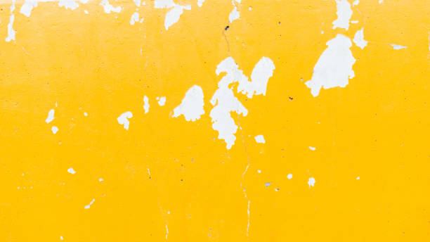 istock Wall yellow painted peel out texture background 1421479706