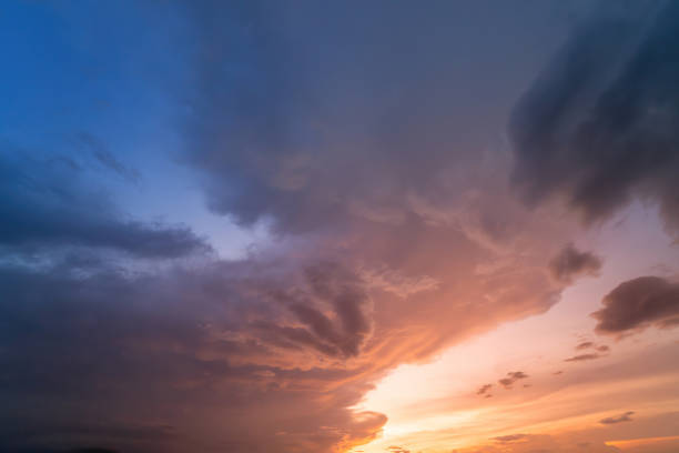 istock Horizon panorama and dramatic twilight sky and cloud sunset background. Natural sky background texture, beautiful color. Dark clouds, big storm and rain. 1421480995