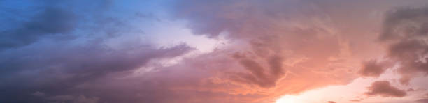 istock Horizon panorama and dramatic twilight sky and cloud sunset background. Natural sky background texture, beautiful color. Dark clouds, big storm and rain. 1421480996