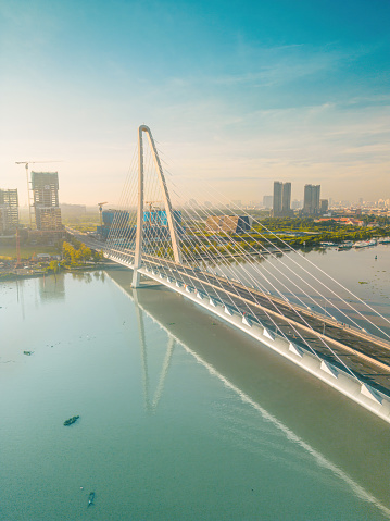 Aerial view of Ho Chi Minh City skyline and skyscrapers on Saigon river, center of heart business at downtown. Morning view. Far away is Landmark 81 skyscraper. Travel and landscape concept