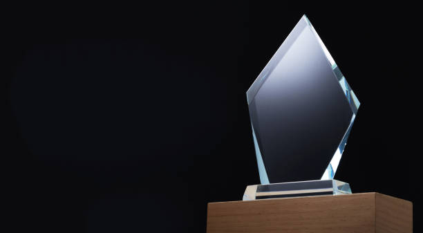 istock crystal trophy against black background 1421487023