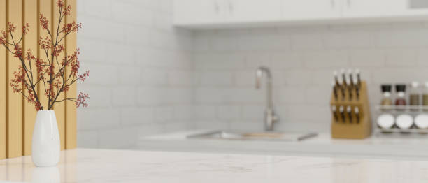 istock Luxury elegance white marble kitchen countertop with copy space over blurred kitchen cooking space 1421488445