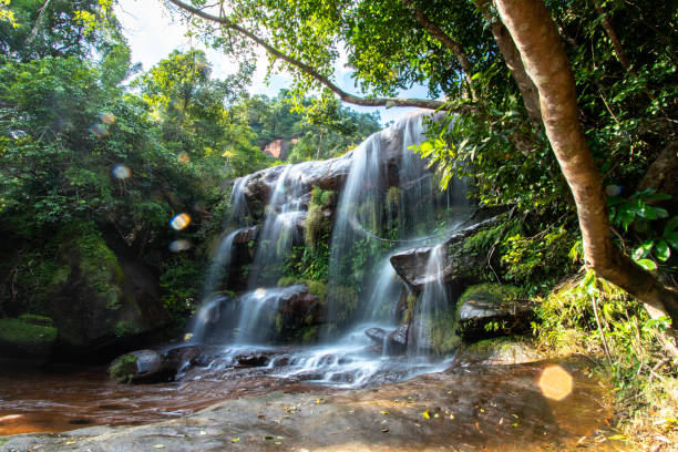 istock waterfall in deep rainforest during rainy season at Bueng Kan, Thailand 1421496803