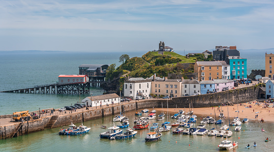 Tenby, Wales - May 2021 : Port and marina in the beautiful little town called Tenby in Pembrokeshire, Carmarthen Bay, Wales, Great Britain