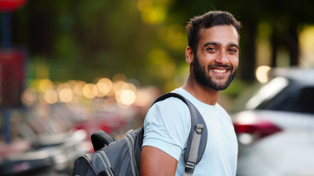 istock Indian student Smiling outdoor image 1421501297