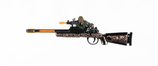 istock toy military machine gun isolated on white background 1421511893