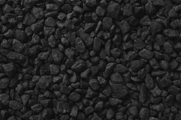 istock Natural stone pattern for background, black and grey stone gravel texture. 1421513774